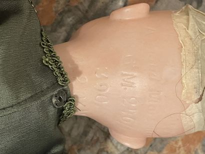 Armand MARSEILLE 
Poupée tête porcelaine...