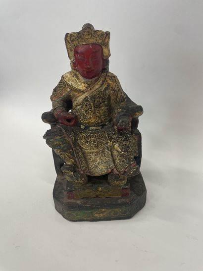 CHINE 
Dignitaire sur son trône en bois sculpté...