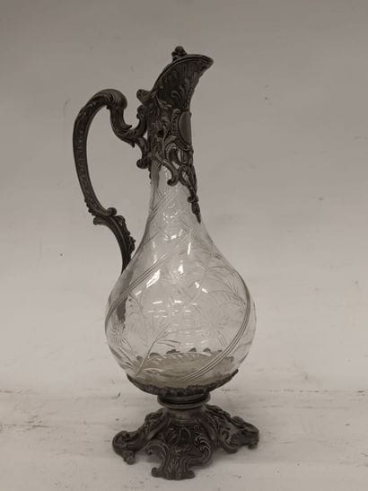 Aiguière en verre taillé
Monture en métal...