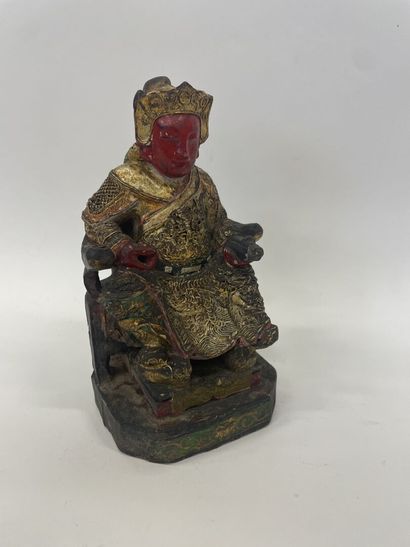 CHINE 
Dignitaire sur son trône en bois sculpté...