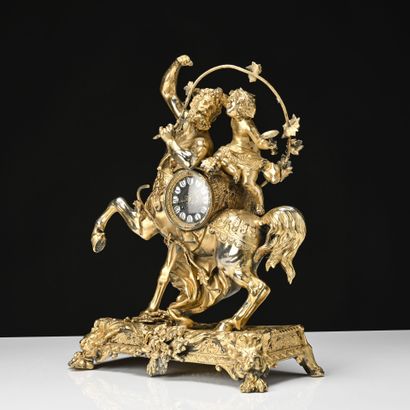 Centaure et bacchus enfant 
Pendule en régule...
