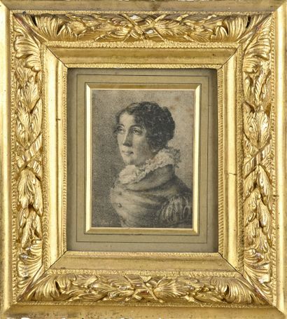 Cadre en bois doré et sculpté de rinceaux...