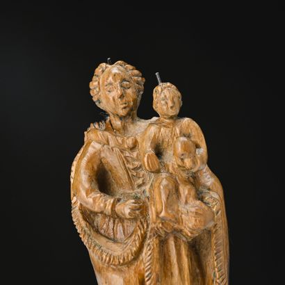 Vierge à l'Enfant en buis sculpté
18ème siècle
H...