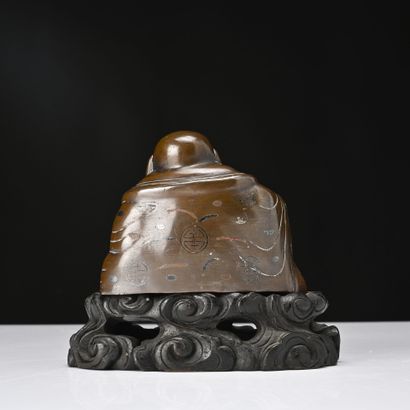 Chine XXe siècle, 
Statuette en bronze, représentant...