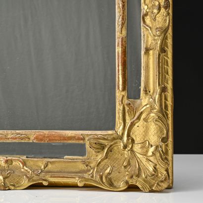 Miroir en bois doré sculpté
Epoque Louis...