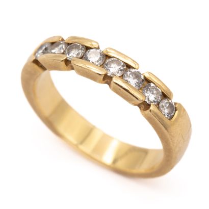Demi alliance en or jaune (750) 18K sertie...
