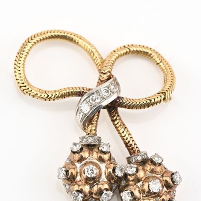 Broche en or jaune (750) 18K figurant un...