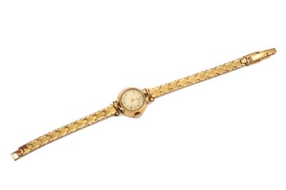 DULUX. Montre de dame, boîtier en or jaune...