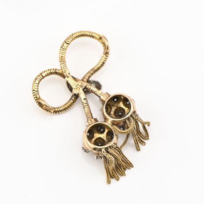 Broche en or jaune (750) 18K figurant un...
