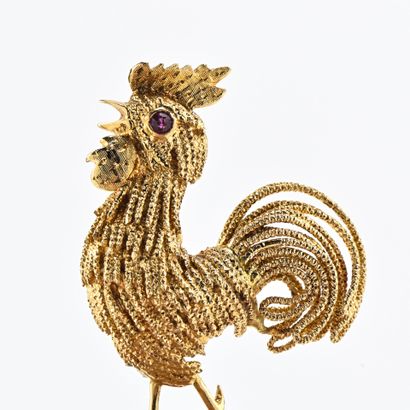 Broche en or jaune (750) 18K figurant un...