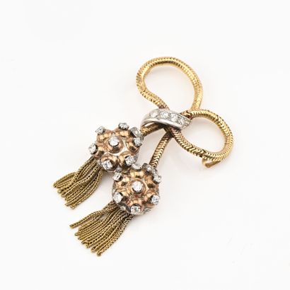Broche en or jaune (750) 18K figurant un...