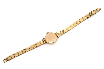 DULUX. Montre de dame, boîtier en or jaune...