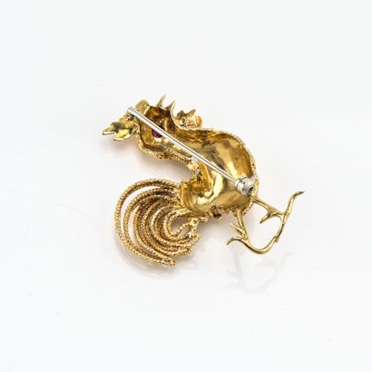 Broche en or jaune (750) 18K figurant un...