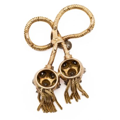 Broche en or jaune 18 K (750) ruban maille...
