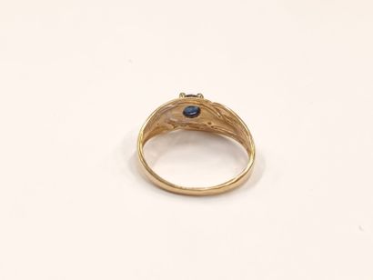 Bague en or jaune et blanc (750) 18K centrée...