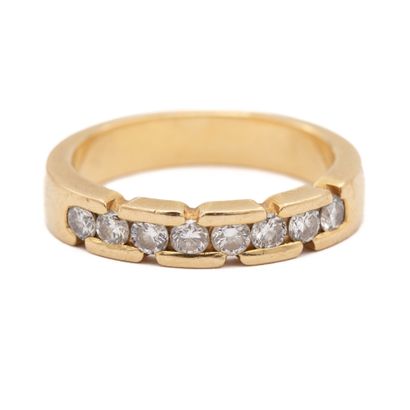 Demi alliance en or jaune (750) 18K sertie...