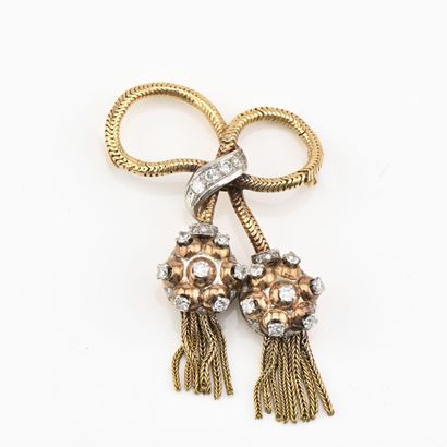 Broche en or jaune (750) 18K figurant un...