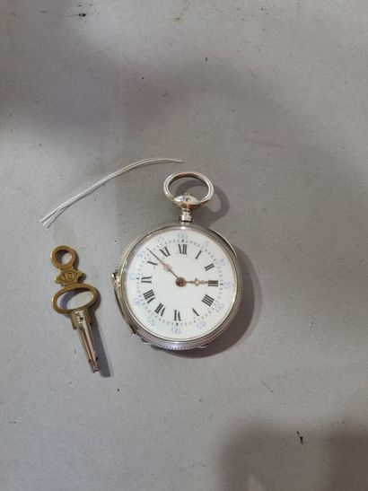 Montre de poche en argent 
H : 5 cm