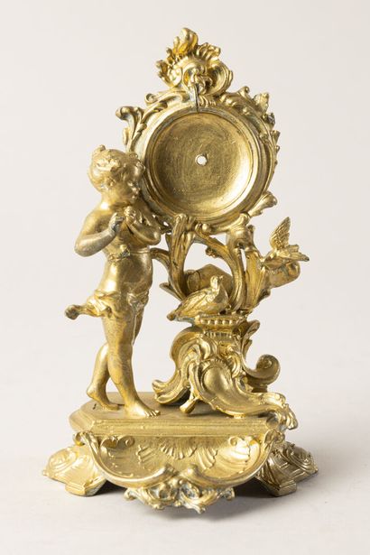 Porte-montre en laiton à décor d'un angelot...
