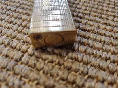 DUNHILL 
Briquet en métal doré 
L :12,5 ...