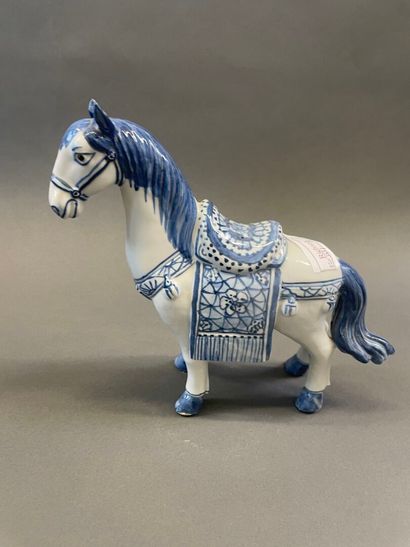 Chine cheval en porcelaine
H : 21 L : 22...
