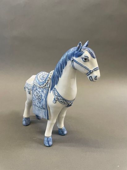 Chine cheval en porcelaine
H : 21 L : 22...