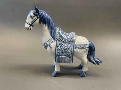 Chine cheval en porcelaine
H : 21 L : 22...