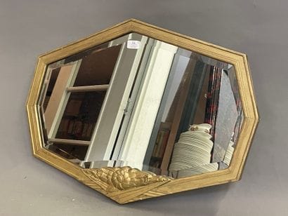 Miroir de forme octogonalze 
époque Arts...