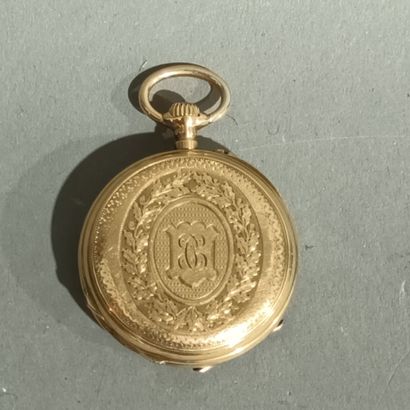 Montre de col deux coques en or jaune 18K...