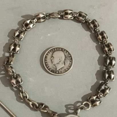 Bracelet en argent (poinçon SANGLIER), une...