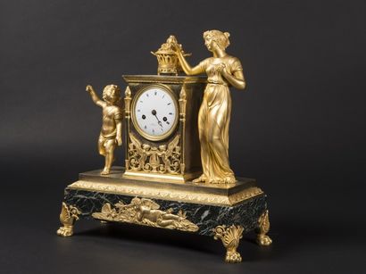 Pendule en bronze doré et marbre vert , jeune-fille...