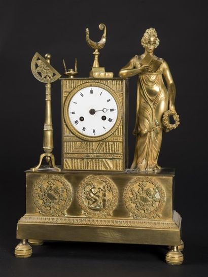 Pendule en bronze ciselé et doré, les arts...