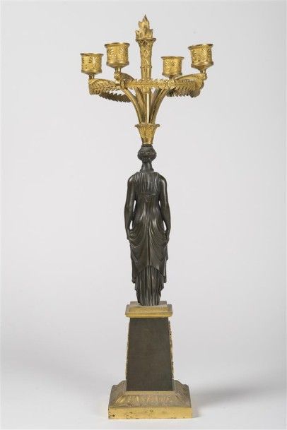 Paire de candélabres en bronze doré et patiné...