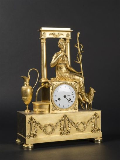 Pendule borne en bronze ciselé et doré début...