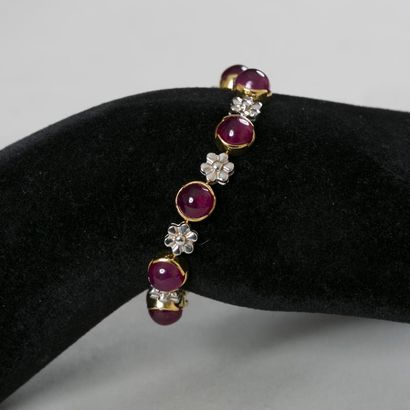 Bracelet en or jaune et or gris formé de...