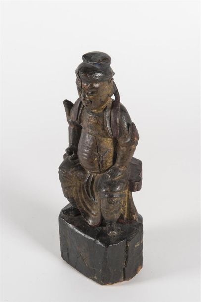 CHINE dignitaire assis, 
Sujet en bois sculpté
H:...