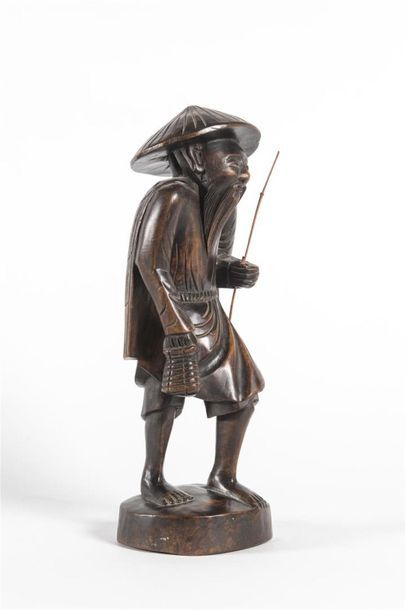 INDOCHINE Sujet en bois sculpté le pêcheur
H:...