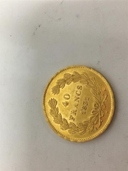 Une pièce de 40 francs or Louis Philippe...