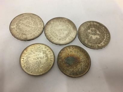 Trois pièces de 50 francs argent et deux...