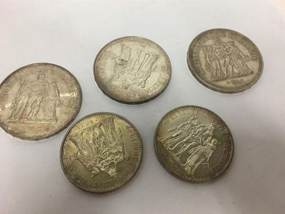 Trois pièces de 50 francs argent et deux...