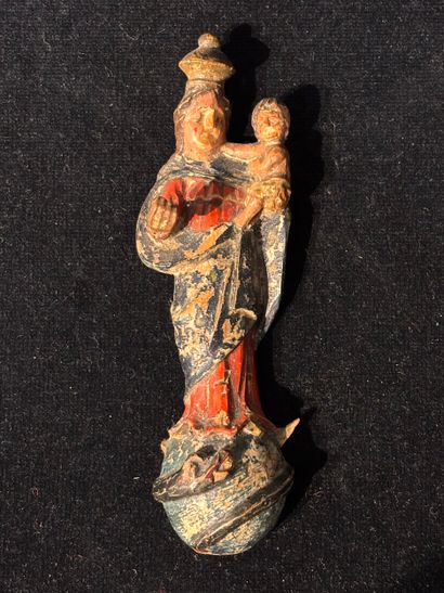 Vierge à l’enfant en bois sculpté polychrome.
Travail...