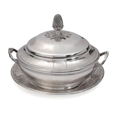 A silver bowl, lid and display stand.
The...