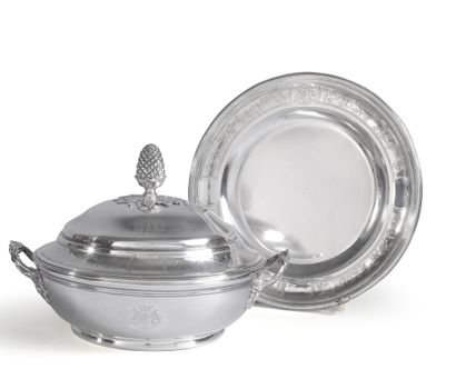 A silver bowl, lid and display stand.
The...