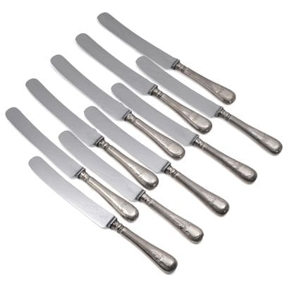 12 silver-filled knives, large steel blades....