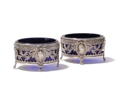 Suite of four salverons, the oval mounts...