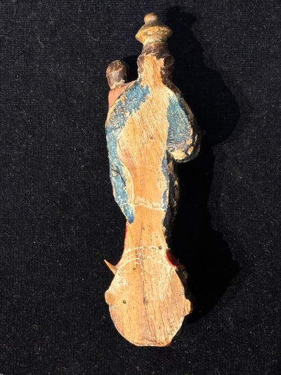Vierge à l’enfant en bois sculpté polychrome.
Travail...
