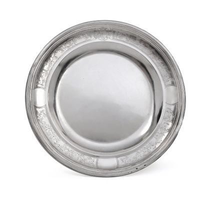 A silver bowl, lid and display stand.
The...