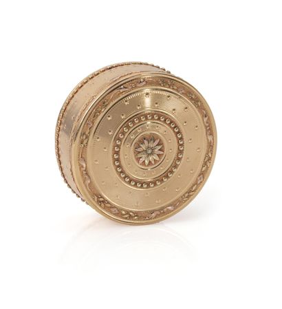 Bonbonnière or round covered box in yellow...