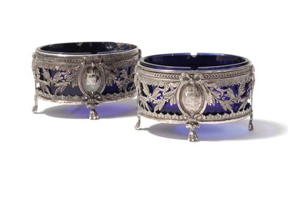 Suite of four salverons, the oval mounts...