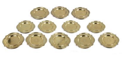 Suite of 12 plates in 950°/°° vermeil, the...